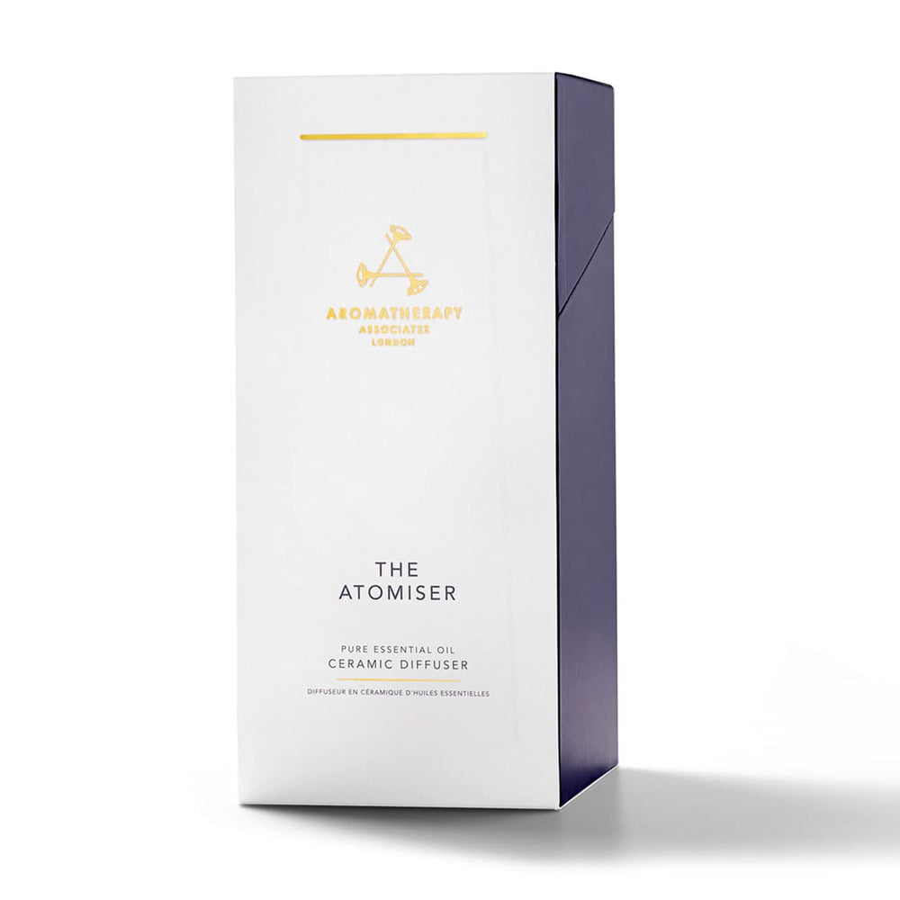 Aromatherapy Associates Atomizer Diffuser charging with a stand for convenient recharging.