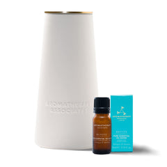 Aromatherapy Associates atomizer diffuser on a nightstand offers subtle fragrance diffusion.