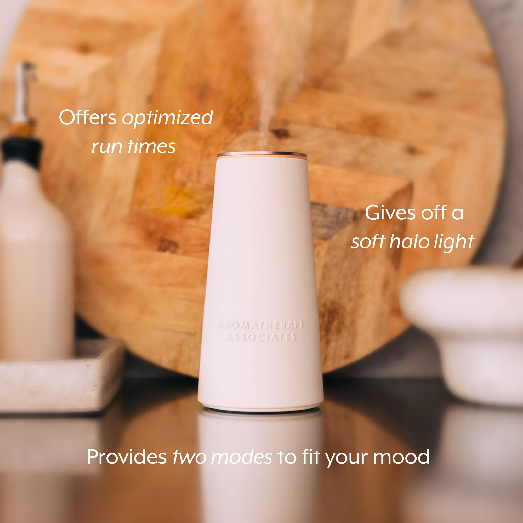 Ceramic exterior Aromatherapy Associates diffuser adds elegance to any room.