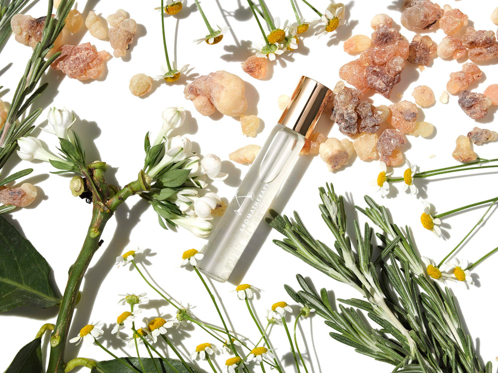 Aromatherapy Associates De-Stress Mind Rollerball travel-size tucked in a bag.