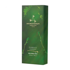 Aromatherapy Associates Forest Therapy Wellness Mist bottle in hand for grounding ritual