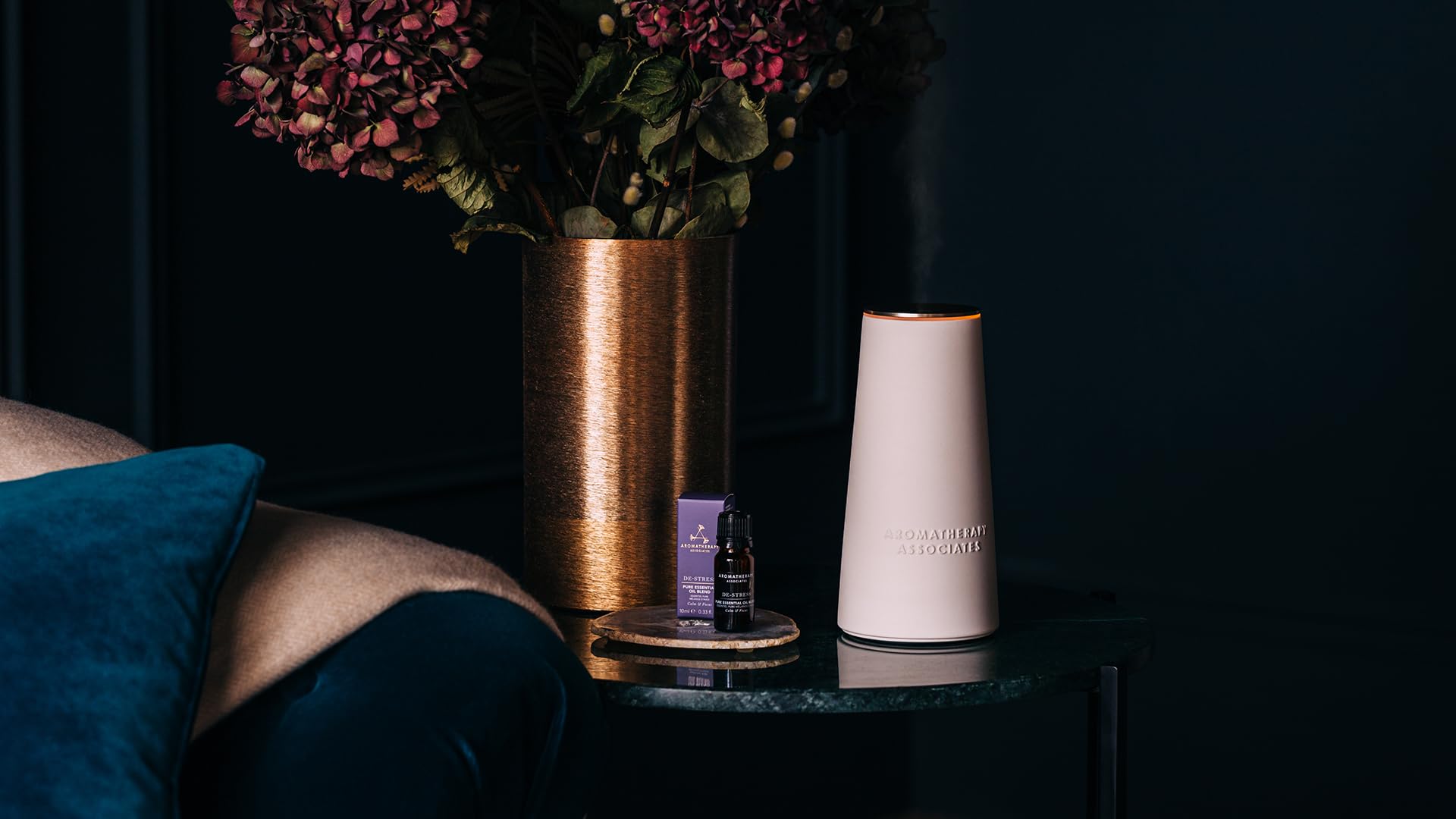 Aromatherapy Associates Revive with Neroli blossoms hints at uplifting aroma.