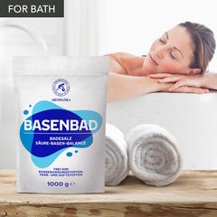 AROMATIKA Alkaline Bath powder dissolving in water for a gentle transformation.