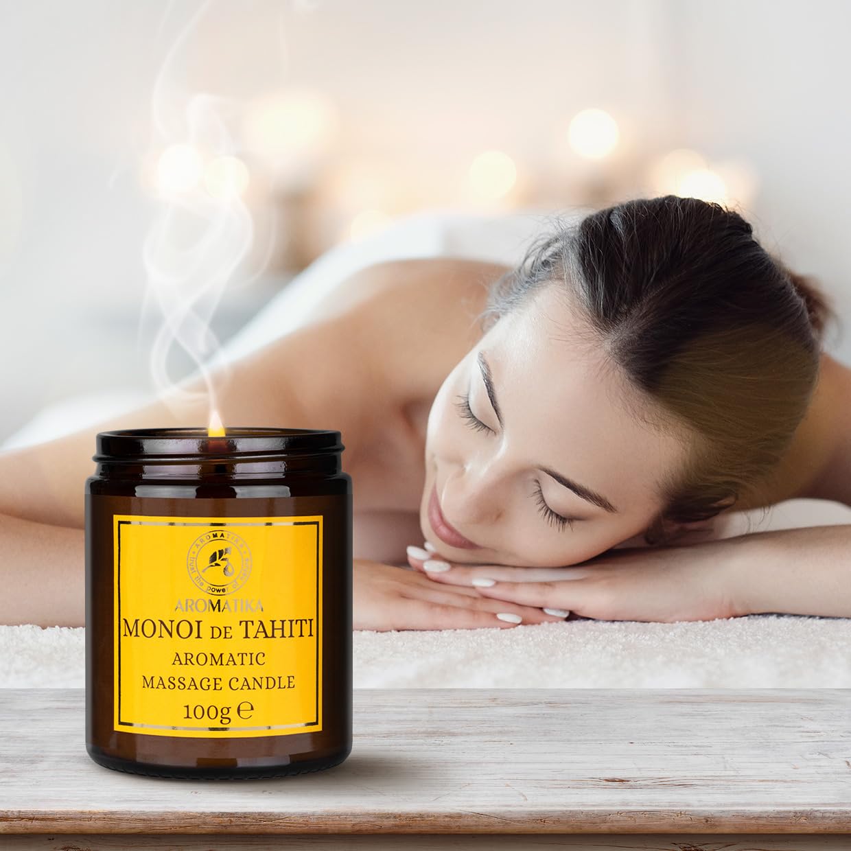 AROMATIKA massage candle packaging shines, perfect for gifting.