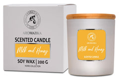 AROMATIKA Milk & Honey candle close-up showing creamy wax and clean burn.