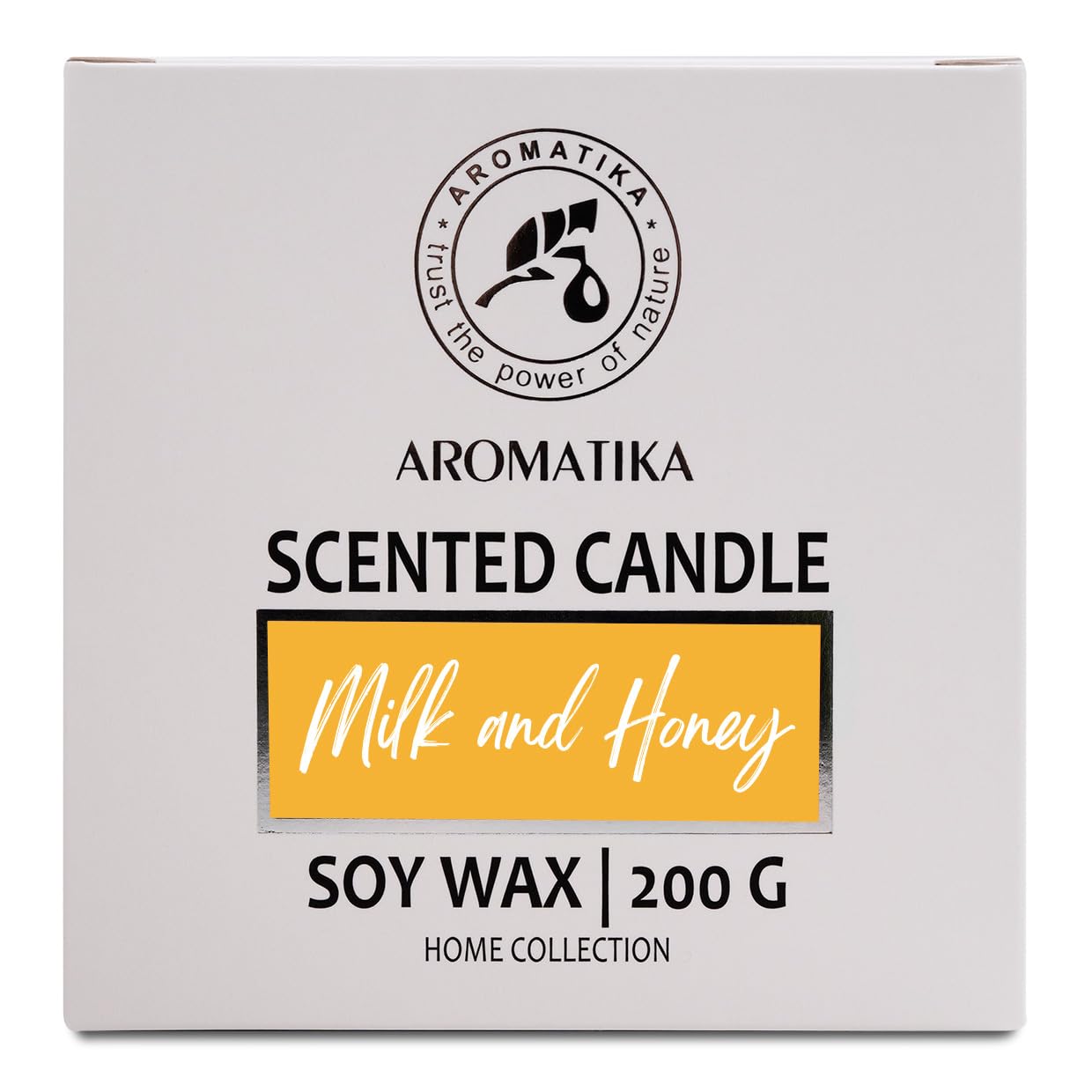 Lit candle on dining table creates warm ambiance.
