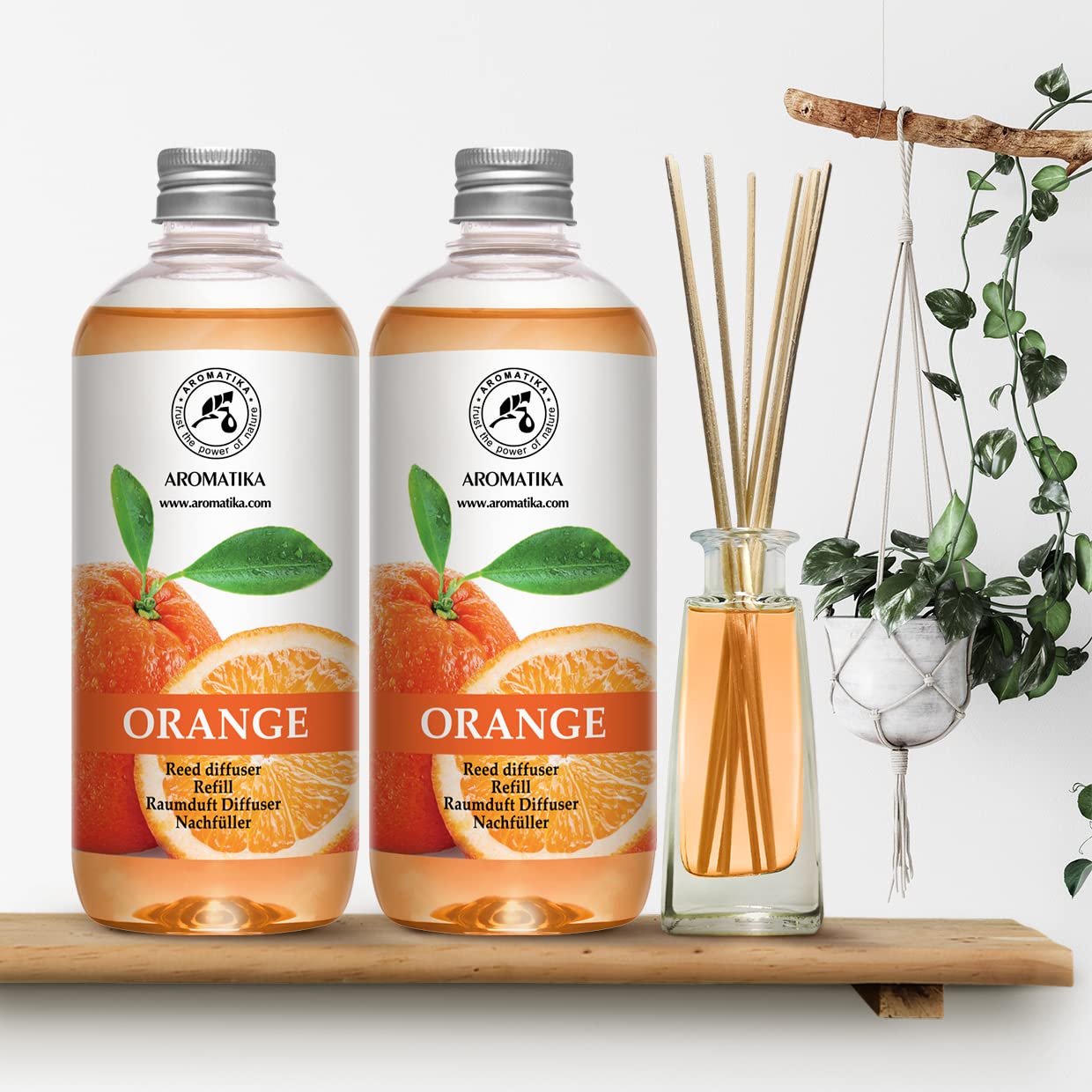 AROMATIKA orange refill label detail emphasizing natural essential oil