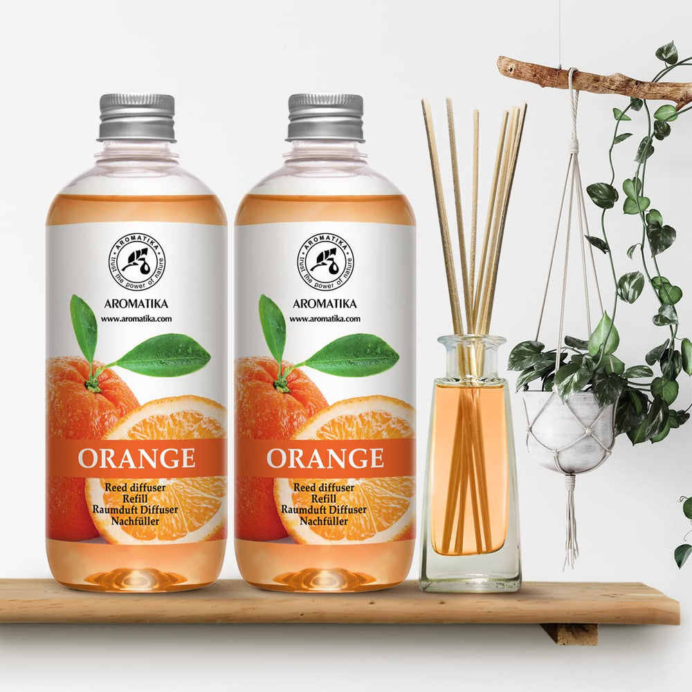 AROMATIKA orange refill label detail emphasizing natural essential oil