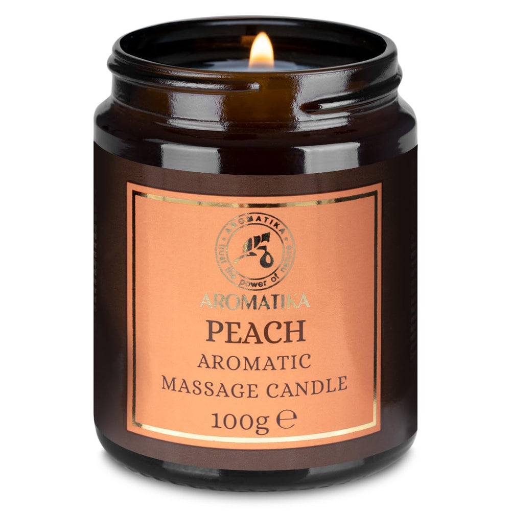 AROMATIKA Peach massage candle glow enhances mood and skin hydration during a massage.