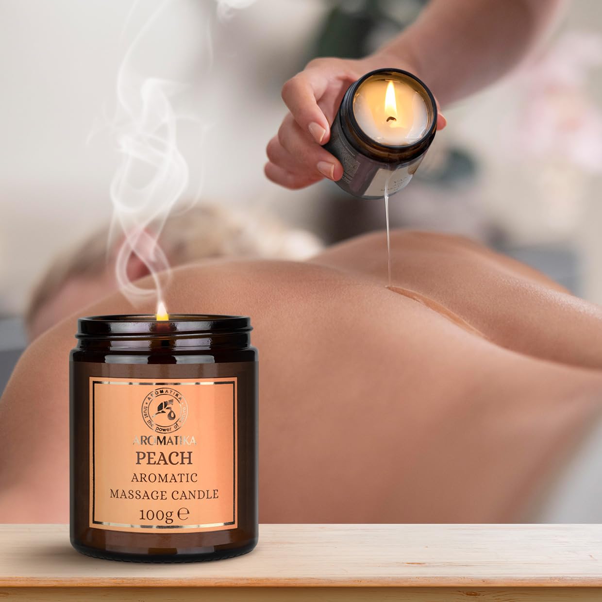 AROMATIKA Peach massage candle spa-like home treatment for relaxation.