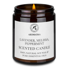 AROMATIKA peppermint scented candle in glass jar for uplifting spaces.
