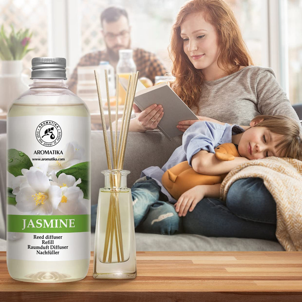 AROMATIKA Monoi Tahiti Jasmine refill displayed in a cozy bedroom scene.