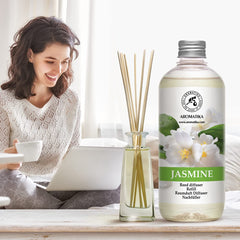 AROMATIKA reed diffuser refill with reeds setup in living room for continuous aroma.