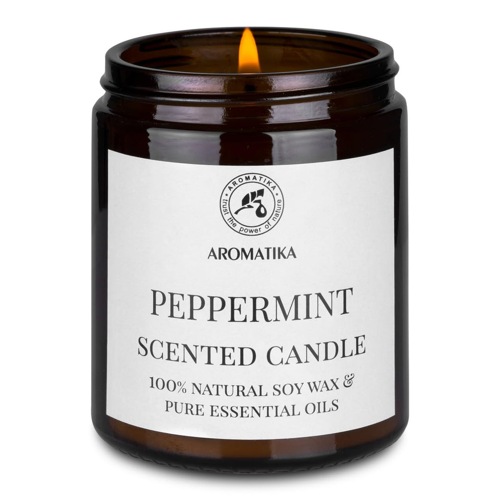 AROMATIKA peppermint candle in dining room setting, refreshing aroma.