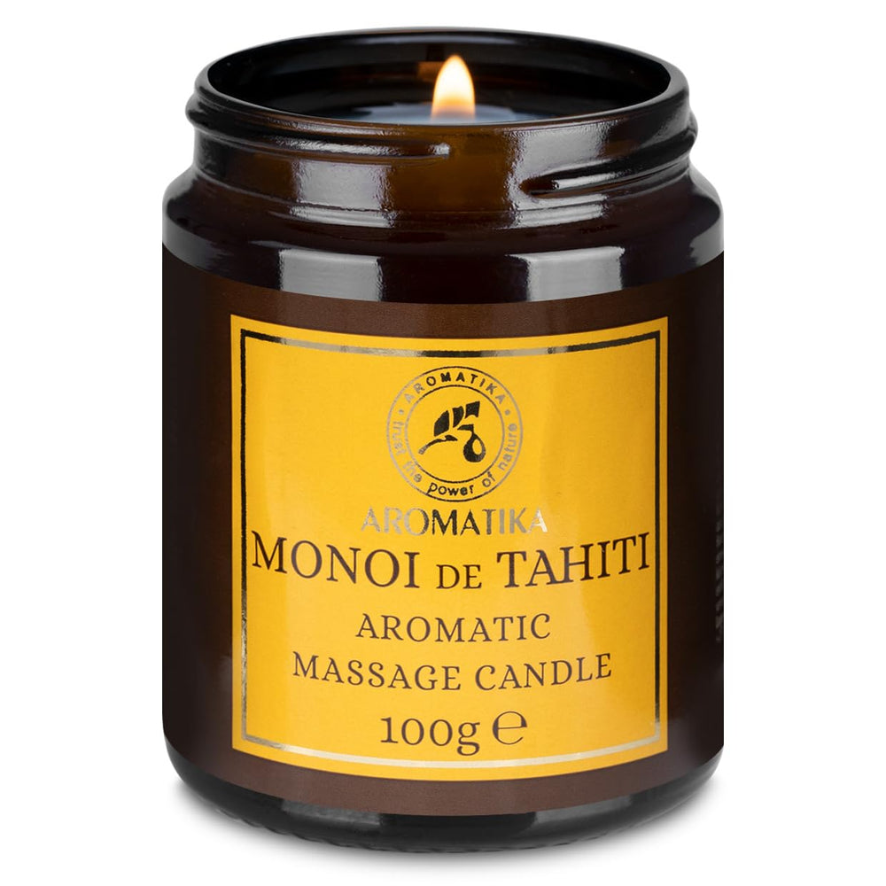 AROMATIKA scented massage candle Monoi Tahiti glows softly for a relaxing massage.