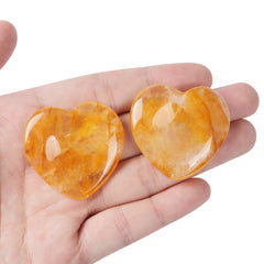 Artistone citrine heart thumb stone closeup highlighting smooth calming texture
