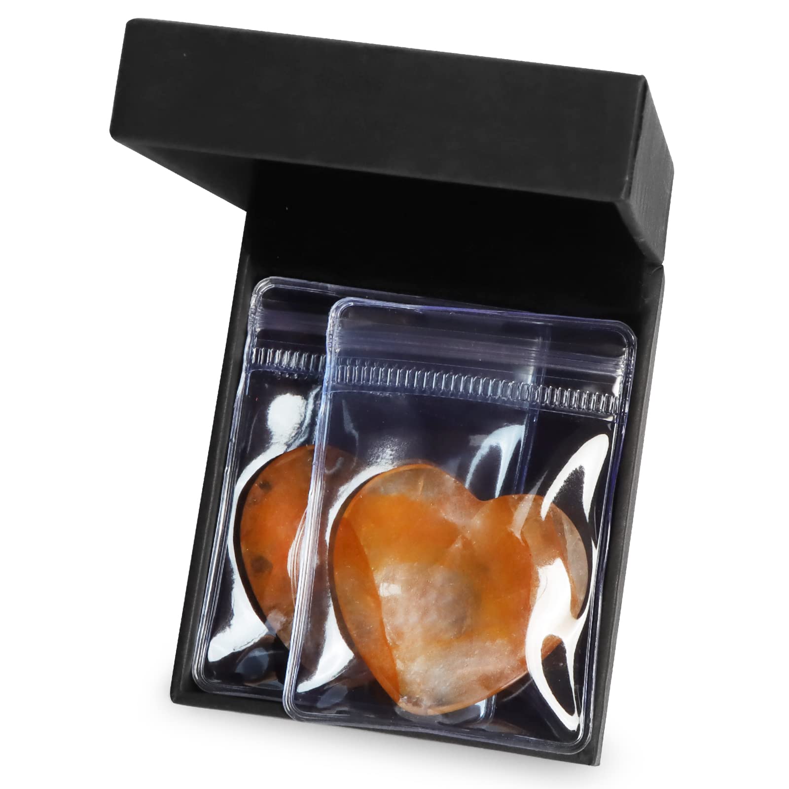 Artistone citrine heart worry stone in serene meditation setup