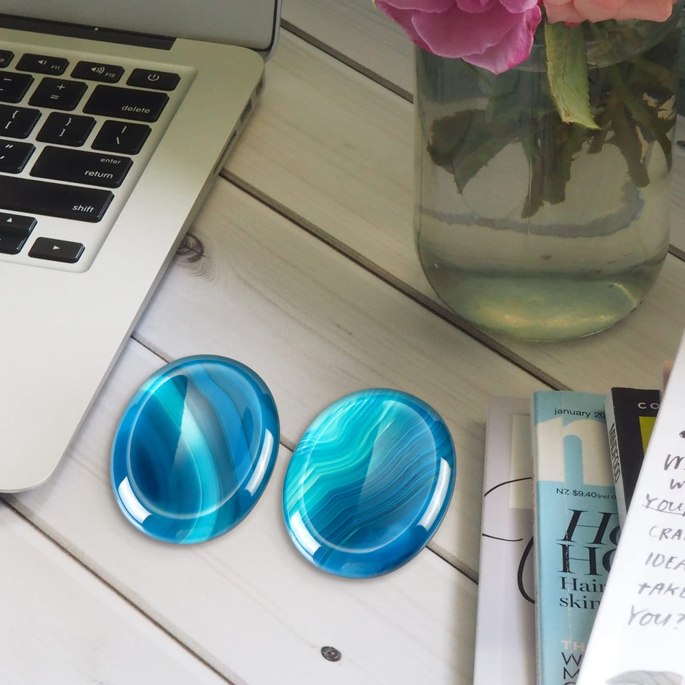 Artistone hand-carved blue agate crystal fits easily in your pocket.