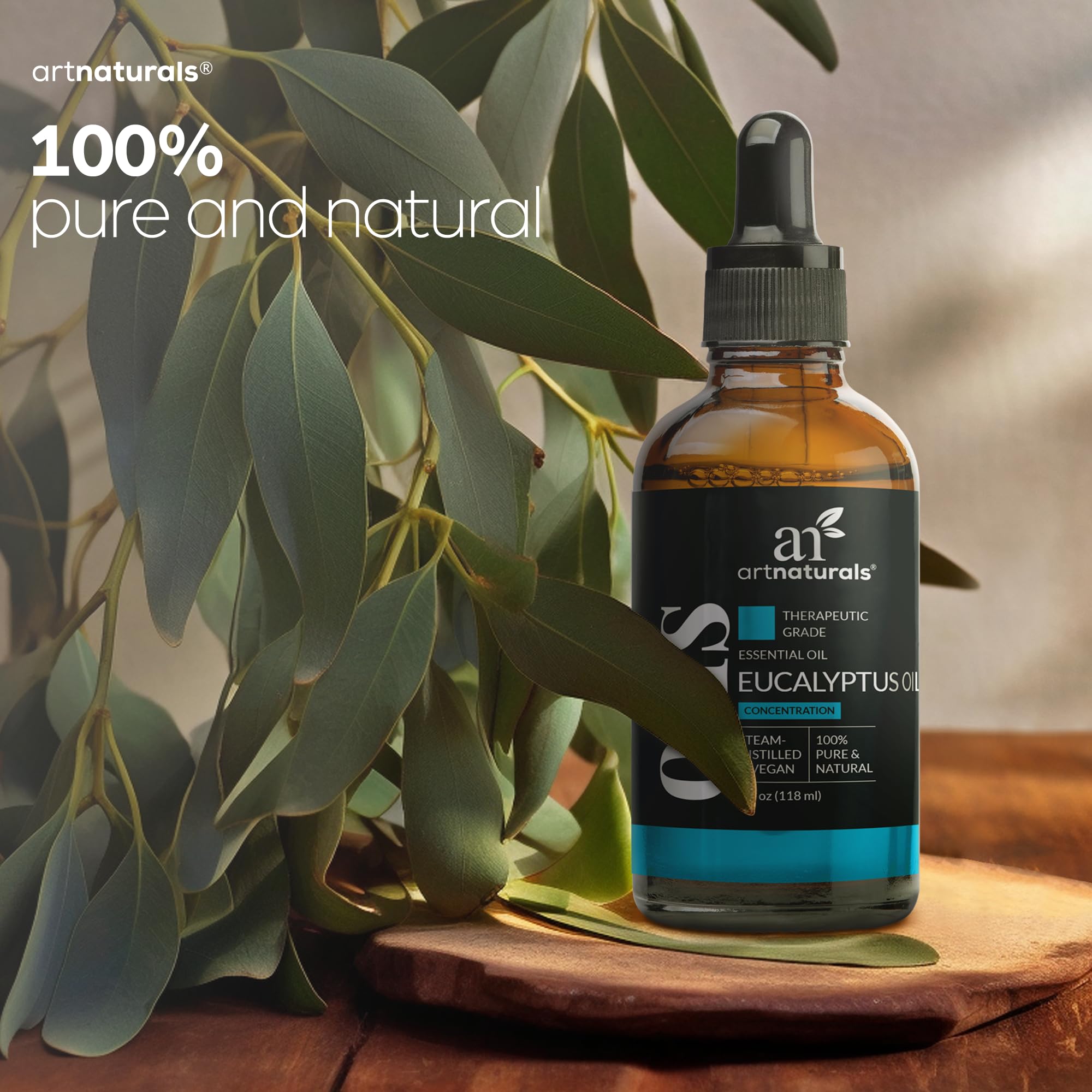 ArtNaturals eucalyptus essential oil with carrier oil in a DIY skincare setup.
