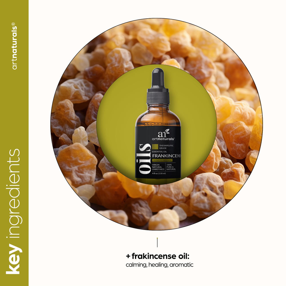 ArtNaturals Frankincense essential oil bottle beside carrier oil for dilution.