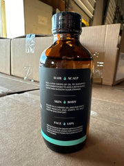 ArtNaturals Rosemary Essential Oil drops for soothing massage blends.