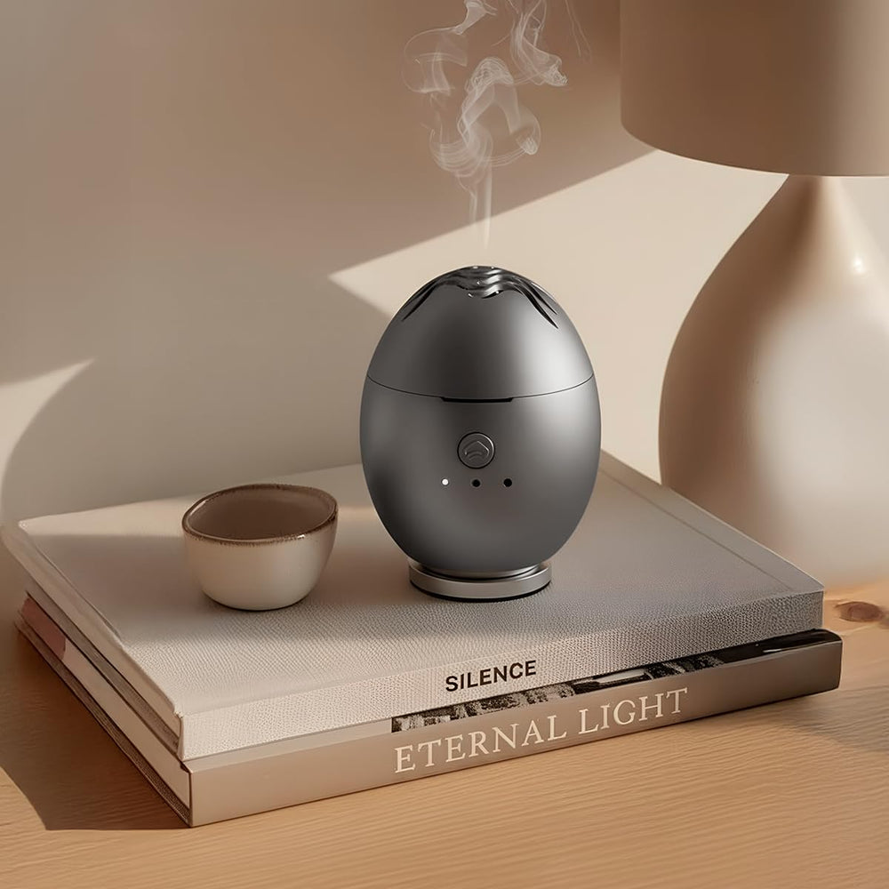Artronic Orbby diffuser front view, compact desk-friendly flameless design for safe office use.