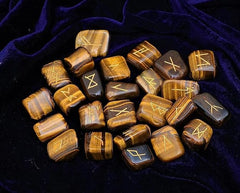 Arts Of India Tiger Eye rune stone held for meditative focus