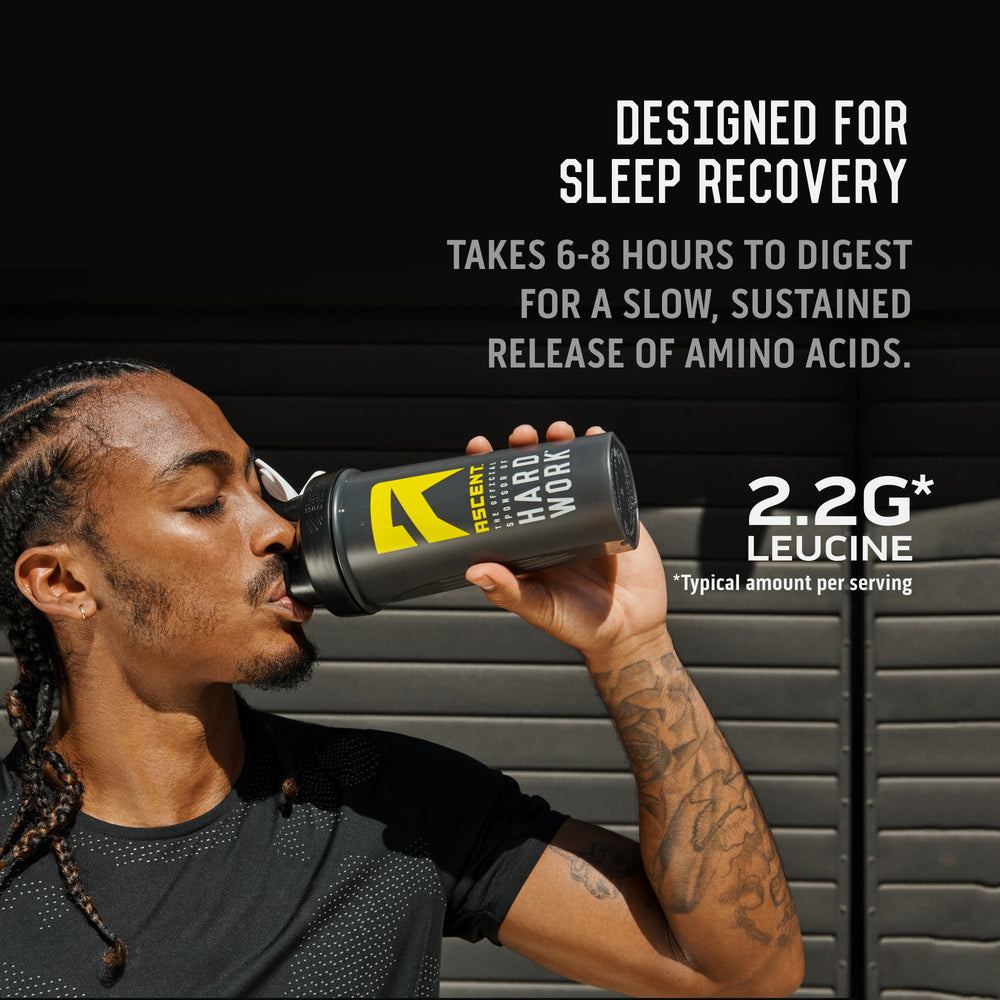 Ascent Casein Vanilla Bean powder in glass with spoon and bowl for recipes.