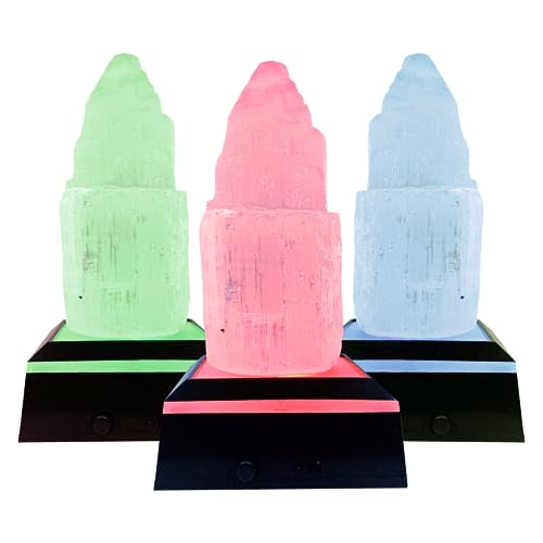 ASENTE selenite crystal tower with light stand showcases soft illumination for meditation.