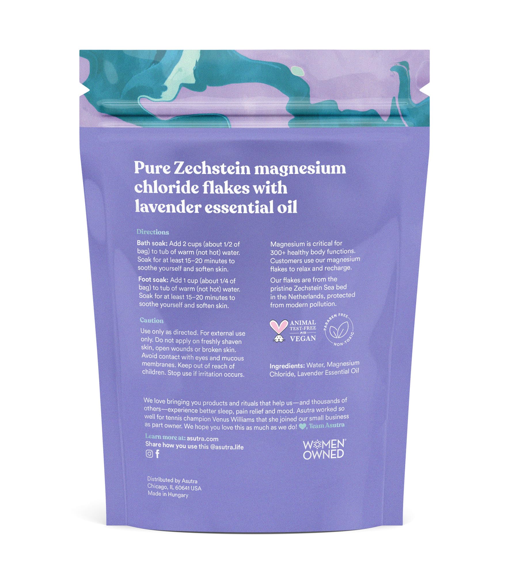 ASUTRA lavender bath flakes dissolving in warm water for aromatherapy calm.