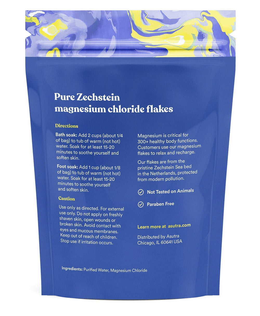 ASUTRA Magnesium Chloride Bath Flakes in tub shows soothing soak for tired muscles.