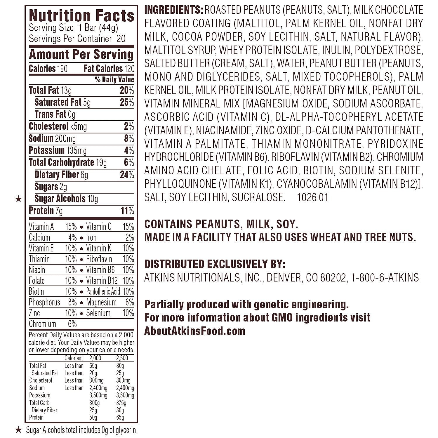 Close-up of Atkins Caramel Chocolate Nut Roll cross-section, showing protein-packed center.