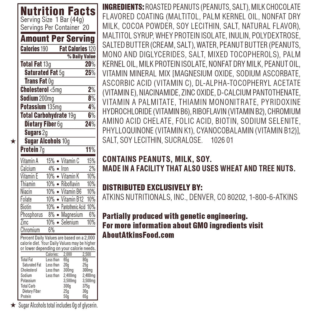 Close-up of Atkins Caramel Chocolate Nut Roll cross-section, showing protein-packed center.