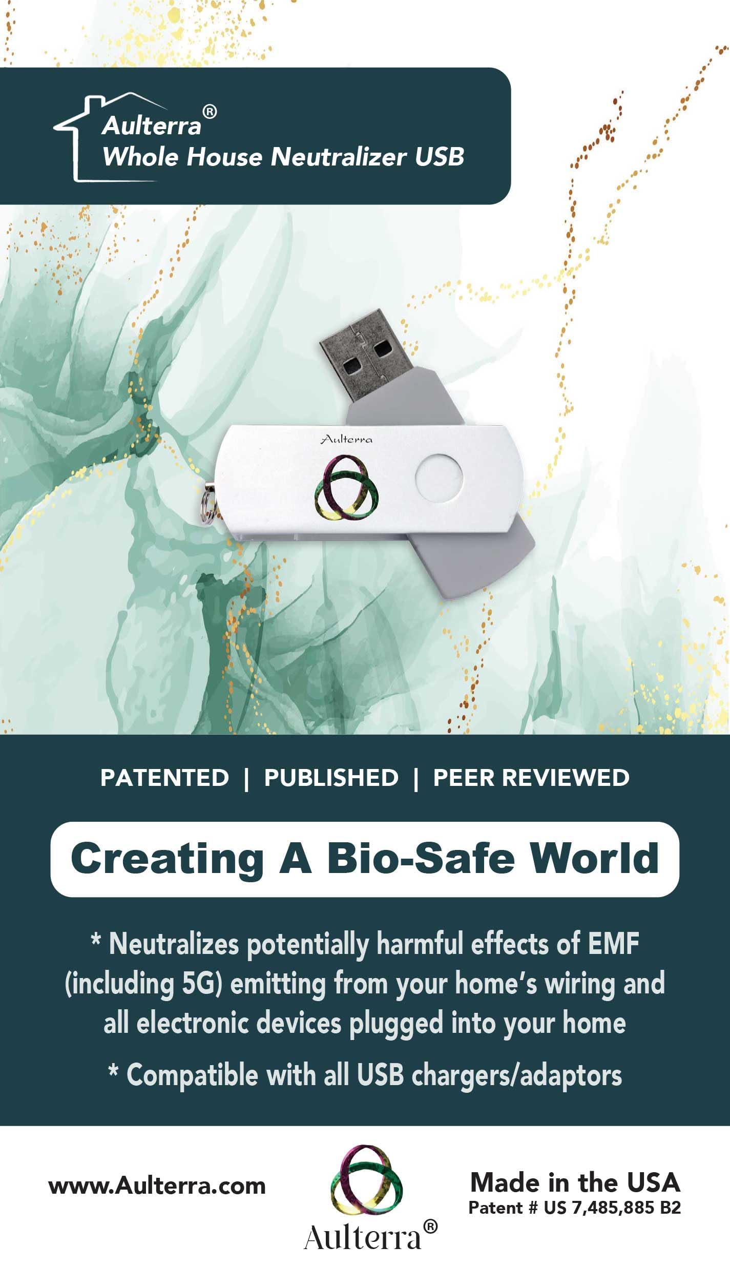 Aulterra EMF Home Neutralizer USB beside a computer to balance signals.