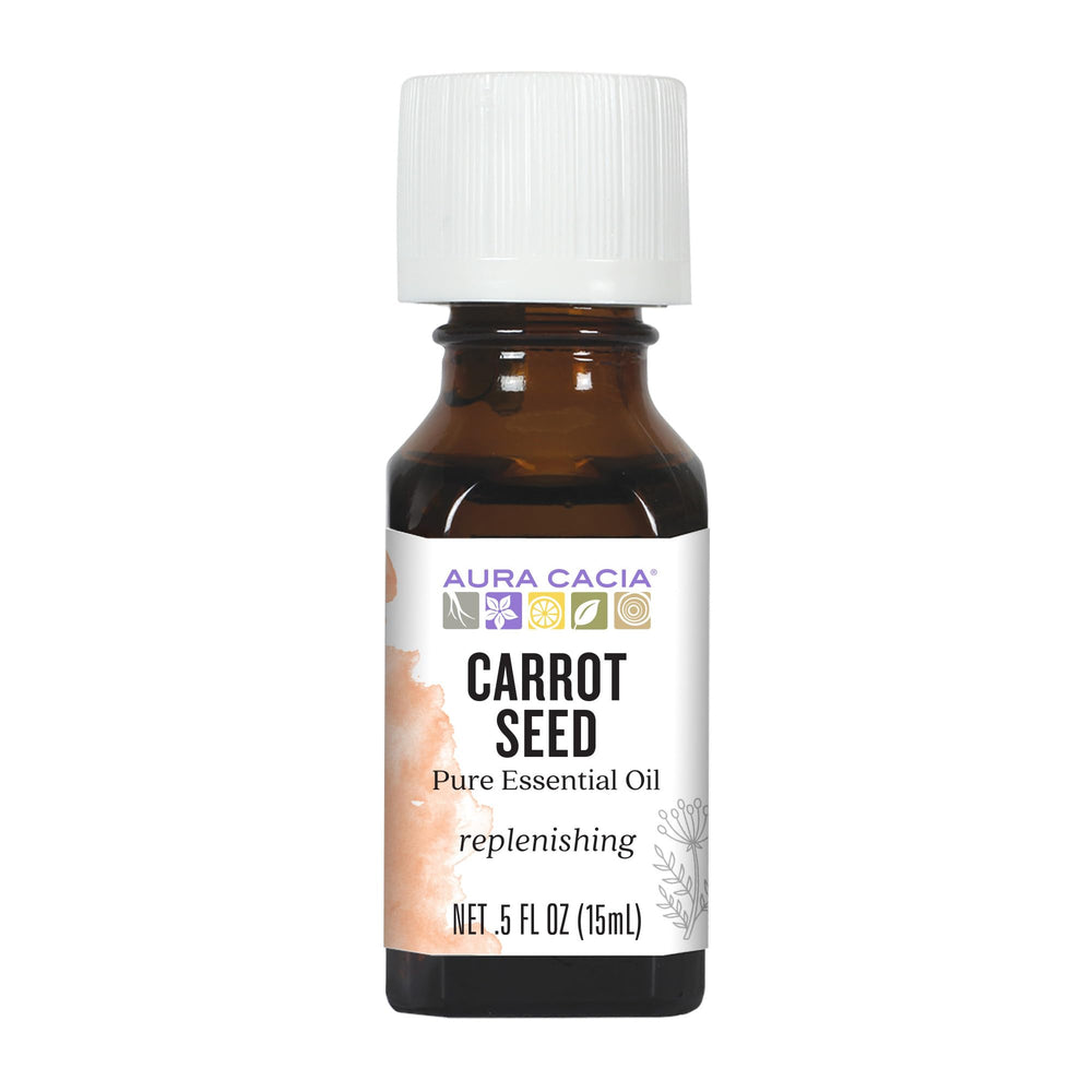 Aura Cacia carrot seed essential oil bottle for grounding aromatherapy and mood-enhancing routines