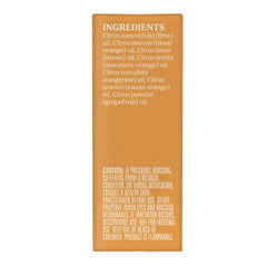Aura Cacia Citrus Burst in diffuser setup offering a light, refreshing ambiance