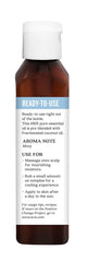 Aura Cacia fractionated coconut oil bottle highlighting lightweight carrier.