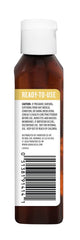 Aura Cacia GC/MS purity label on frankincense oil bottle.