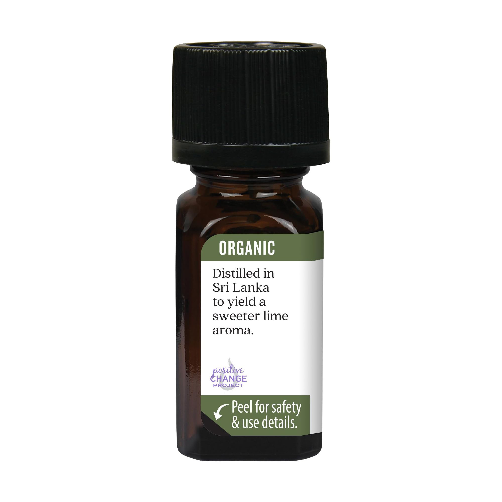 Aura Cacia lime oil bottle pour for DIY skincare blends.