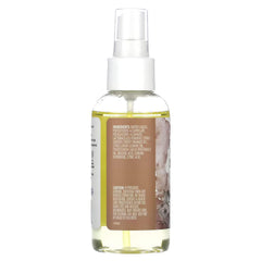 Aura Cacia Patchouli Sweet Orange Aromatherapy Mist spray in air for room ambiance