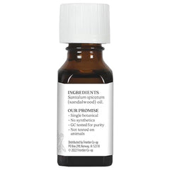 Aura Cacia Sandalwood essential oil drops for scalp massage and skincare.