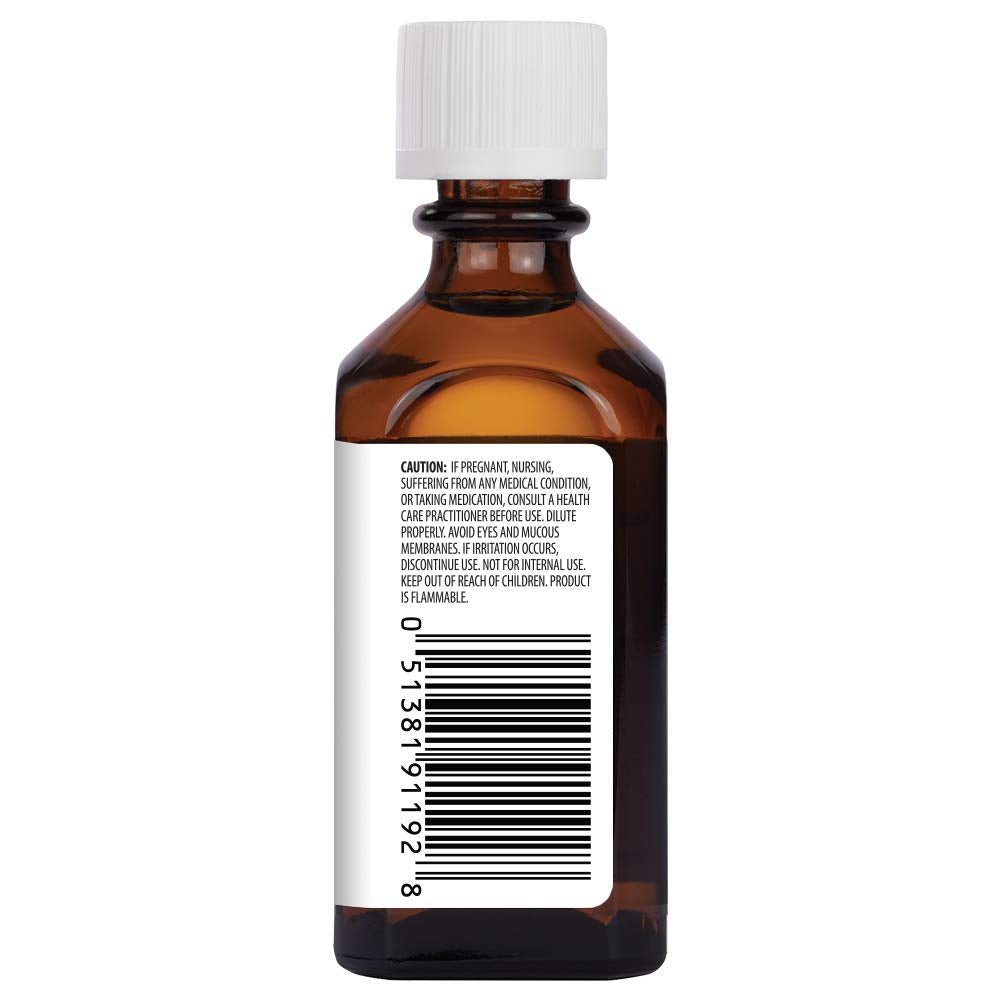 Aura Cacia Tea Tree Oil label shows purity certification and origin