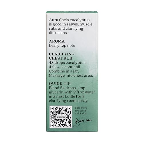 Aura Cacia eucalyptus oil bottle beside diffuser, ready to refresh rooms with a strong, camphoraceous aroma.