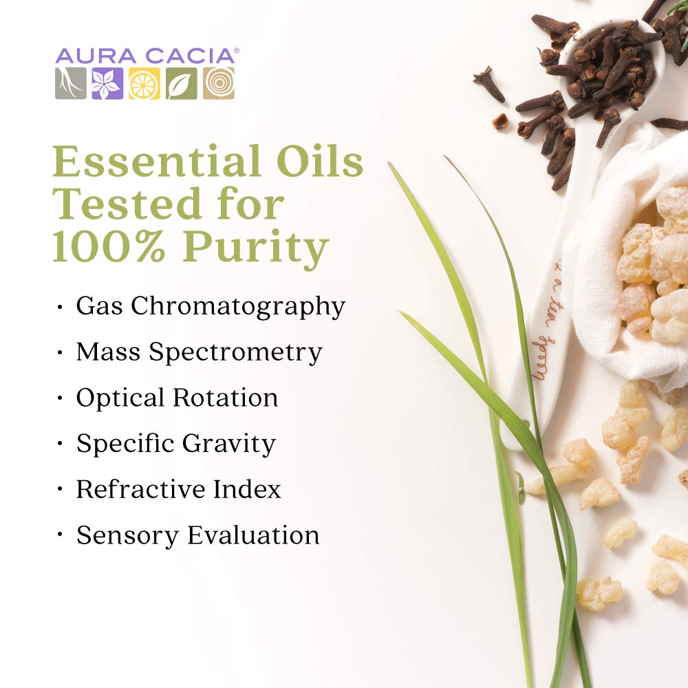 Aura Cacia Frankincense Roll-On gliding over sternum for a calming ritual.