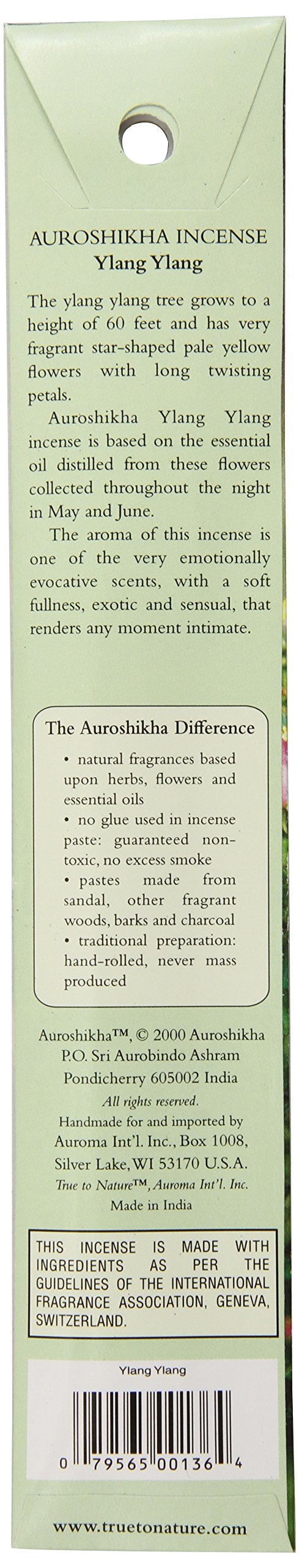 Auroshikha Ylang Ylang incense stick in holder releasing soft fragrance.
