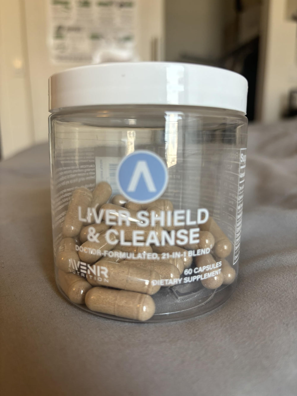 Avenir Nutrition Liver Shield and Cleanse milk thistle graphic emphasizes herbal focus.