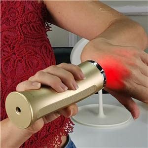 Avorla red-light facial wand close-up with LEDs, visible energy for gentle facial massage.