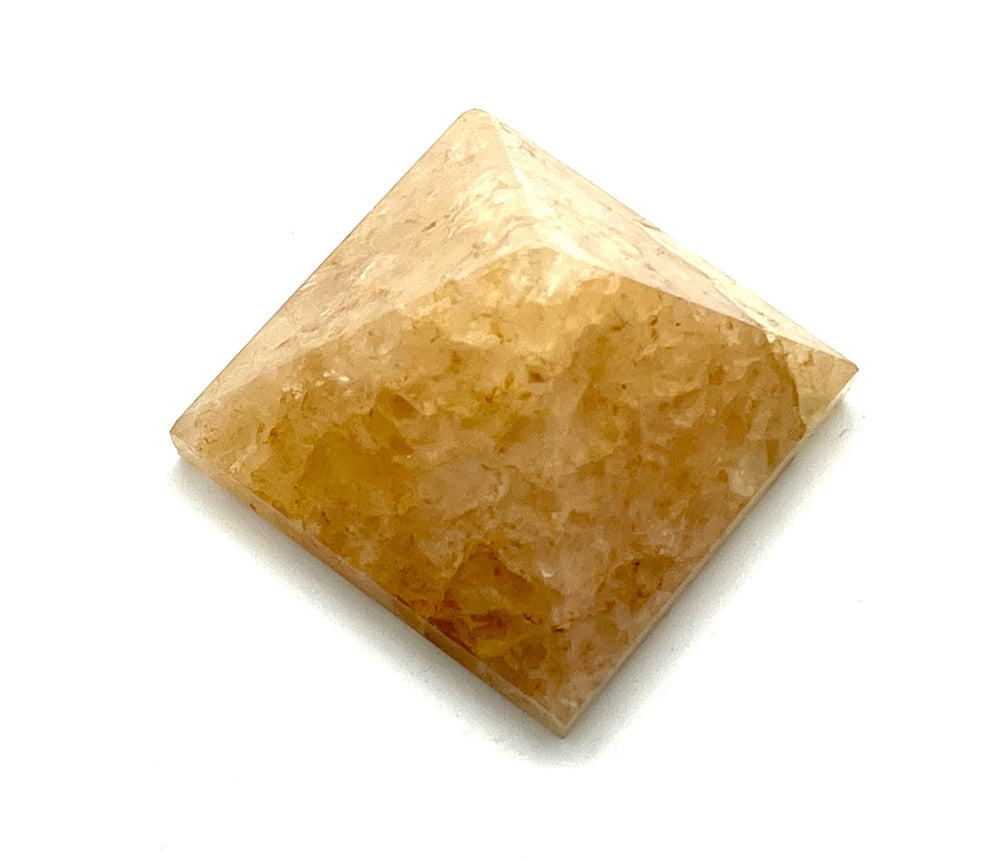 Awaken Your Kundalini solar plexus energy yellow quartz supports personal power during practice.