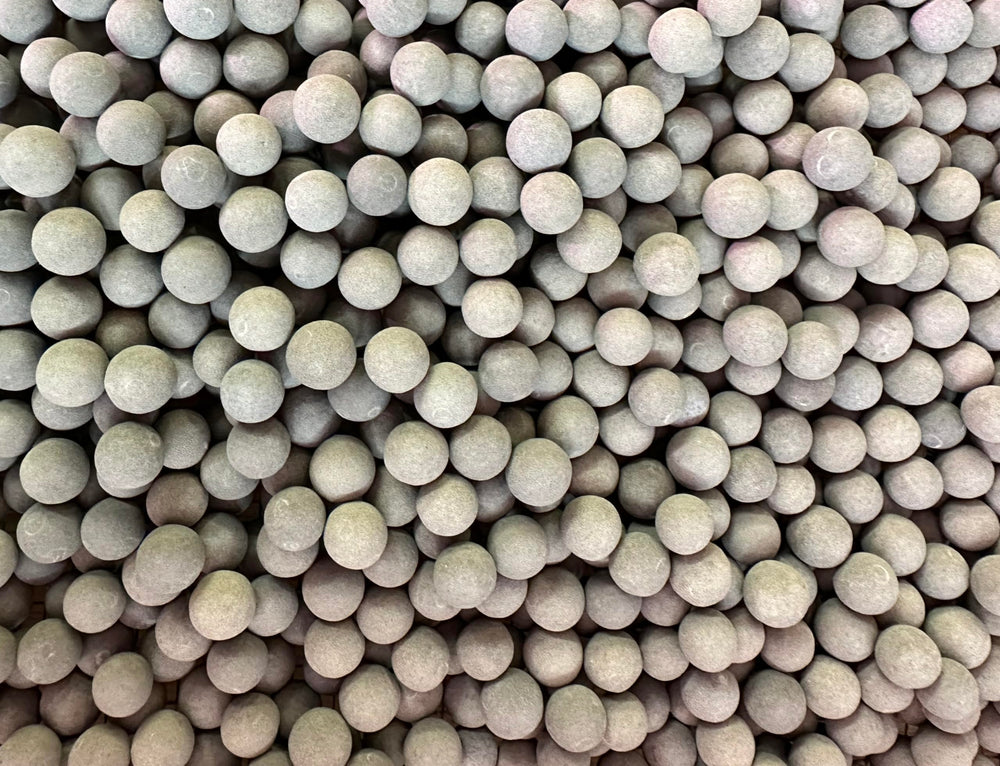 Awesome Aquatic Tourmaline Mineral Balls molting support for shrimp in a clear tank.