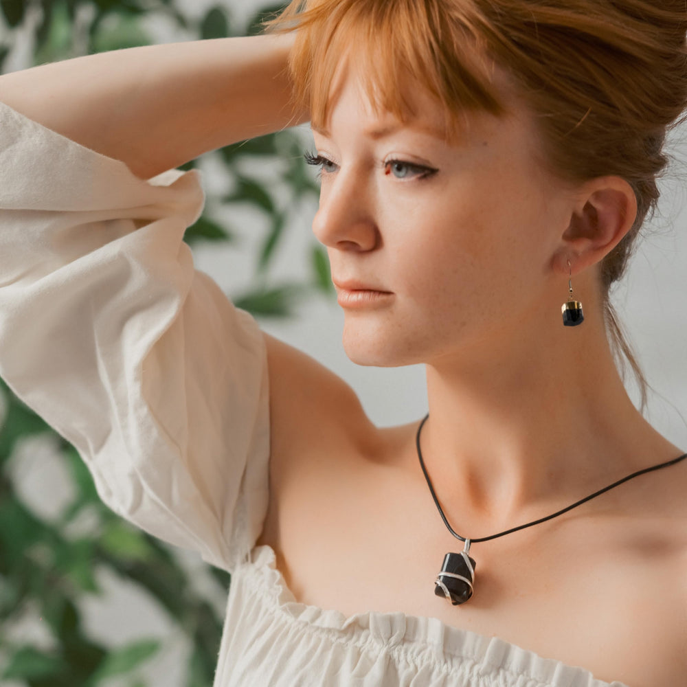 Ayana crystal pendant on display showing natural beauty and craftsmanship.